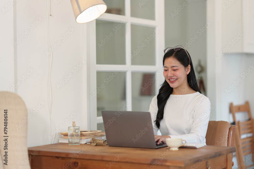 Confident businesswoman using laptop at work Female freelancer connects to internet via computer Bloggers or journalists write new articles, chat online. Confident businesswoman using laptop at work Female freelancer connects to internet via computer Bloggers or journalists write new articles, chat online.