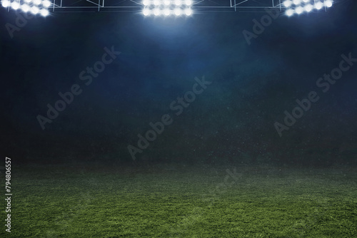 Empty nobody soccer stadium field at night with smoke, soccer background © fotokitas