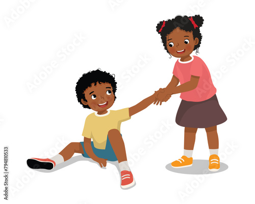 Cute little African girl helping her friend who has fell down to stand up 