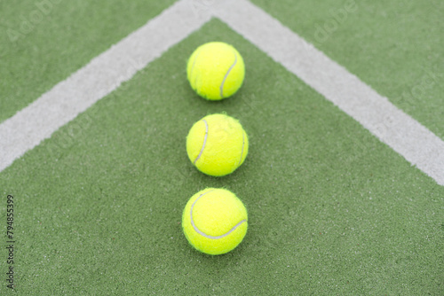 Tennis ball on green grass