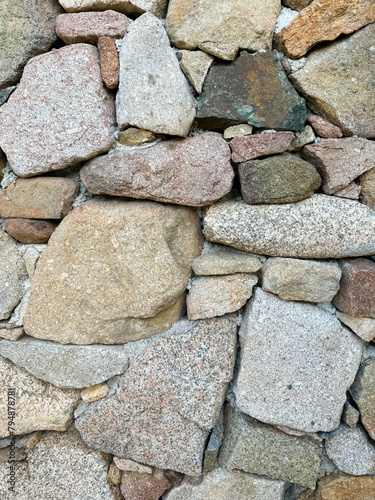 wall and stones of Sardinian granite from Gallura photo