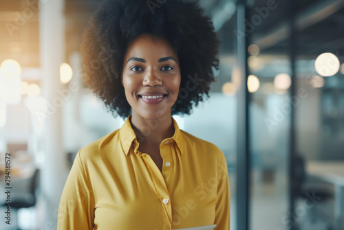 Confident afro businesswoman in office