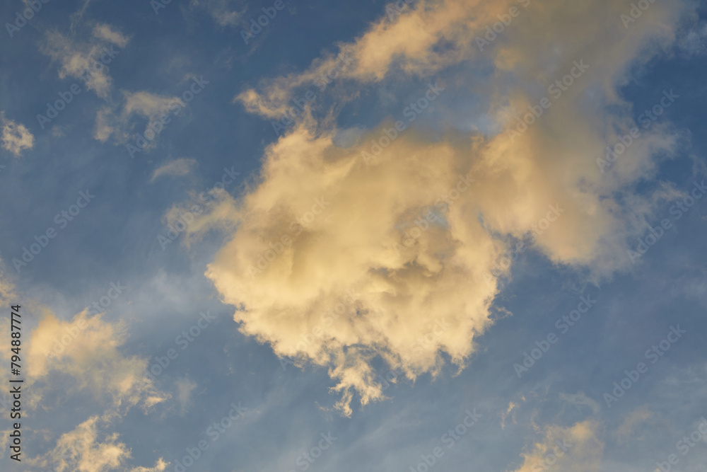 Fluffy clouds during sunset Fluffy clouds during sunset