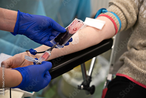 Closeup of woman donating blood