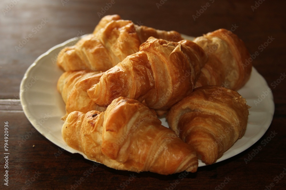 A flaky, buttery pastry originating from France, the croissant is beloved for its crescent shape and rich flavor.