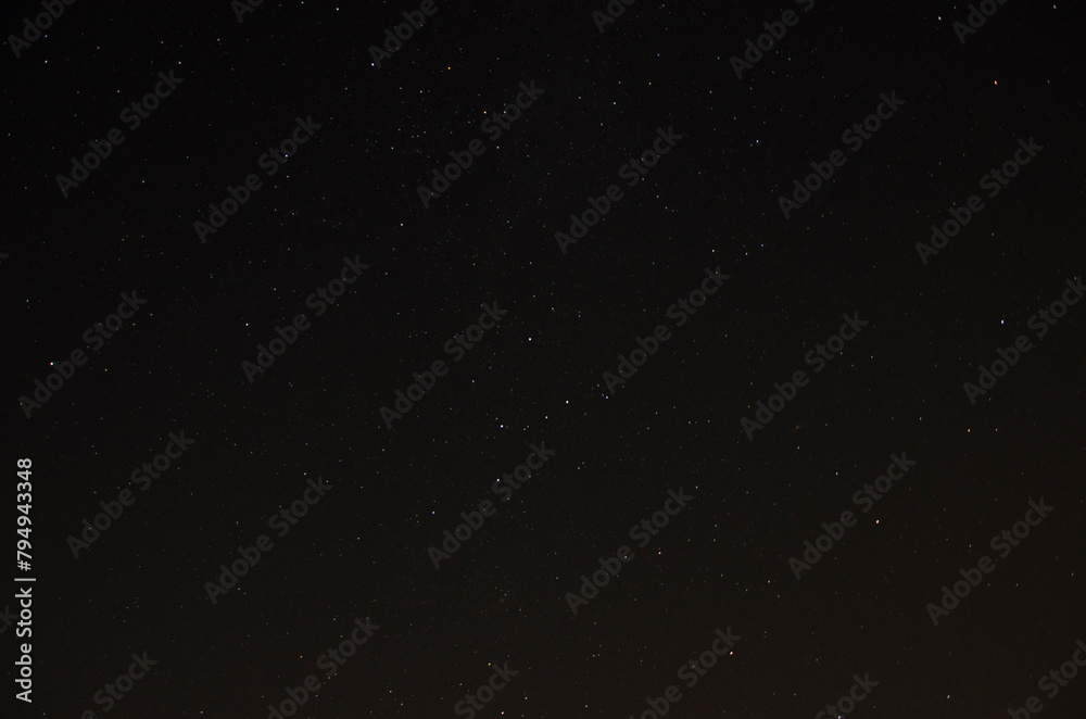 Night sky with stars and space for text. Long exposure photograph.