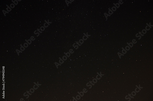 Night sky with stars and space for text. Long exposure photograph.