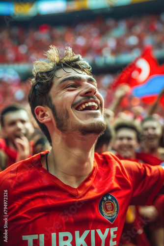 Turkish football soccer fans in a stadium supporting the national team, Ay-Yildizlilar  © PixelGallery