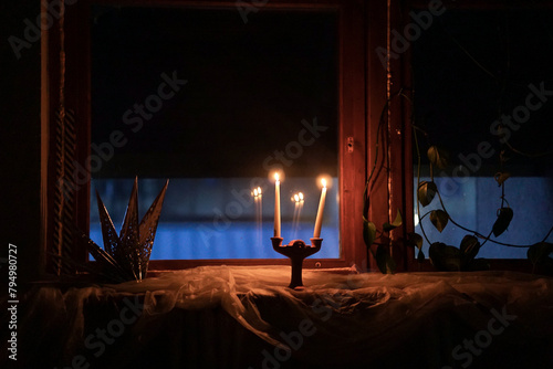 Candle light in the dark room at night