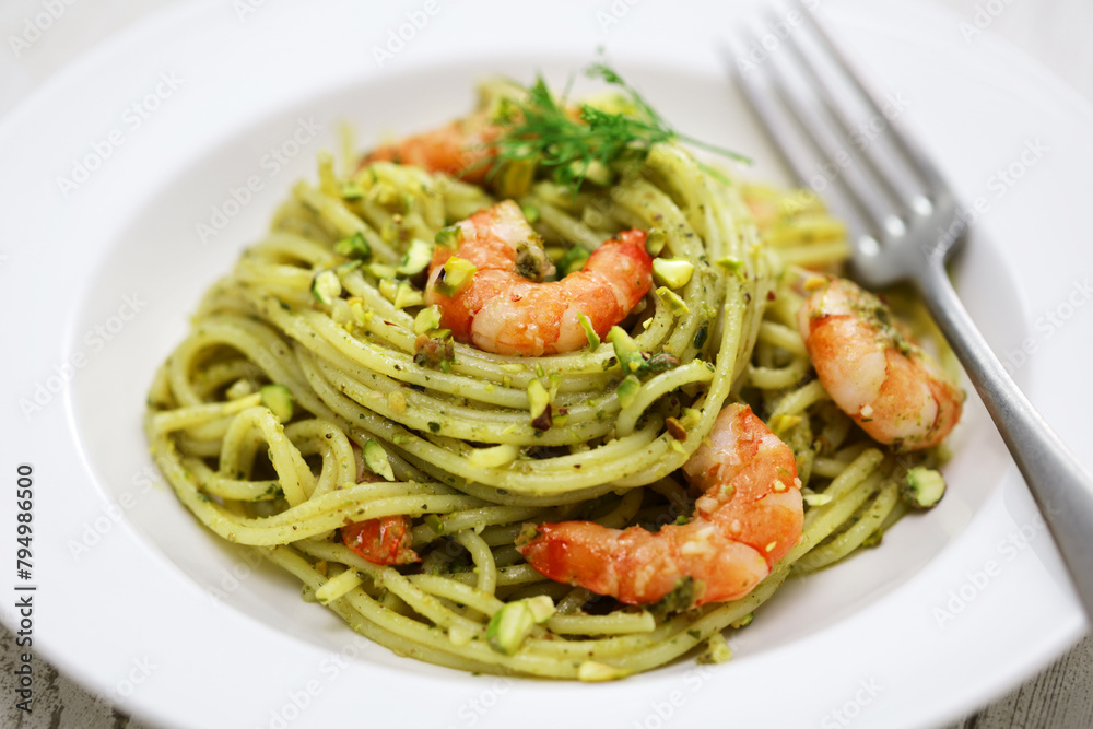 Sicilian pasta with pistachio pesto and shrimp, Italian cuisine Sicilian pasta with pistachio pesto and shrimp, Italian cuisine