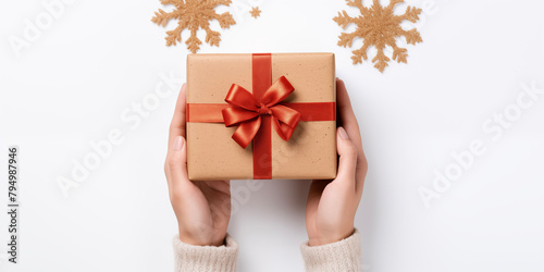 Christmas card template. Happy New year backdrop. Beautiful gift box in hands..