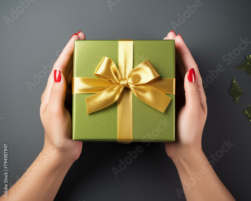 Christmas card template. Happy New year backdrop. Beautiful gift box in hands..