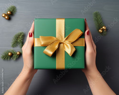 Christmas card template. Happy New year backdrop. Beautiful gift box in hands..