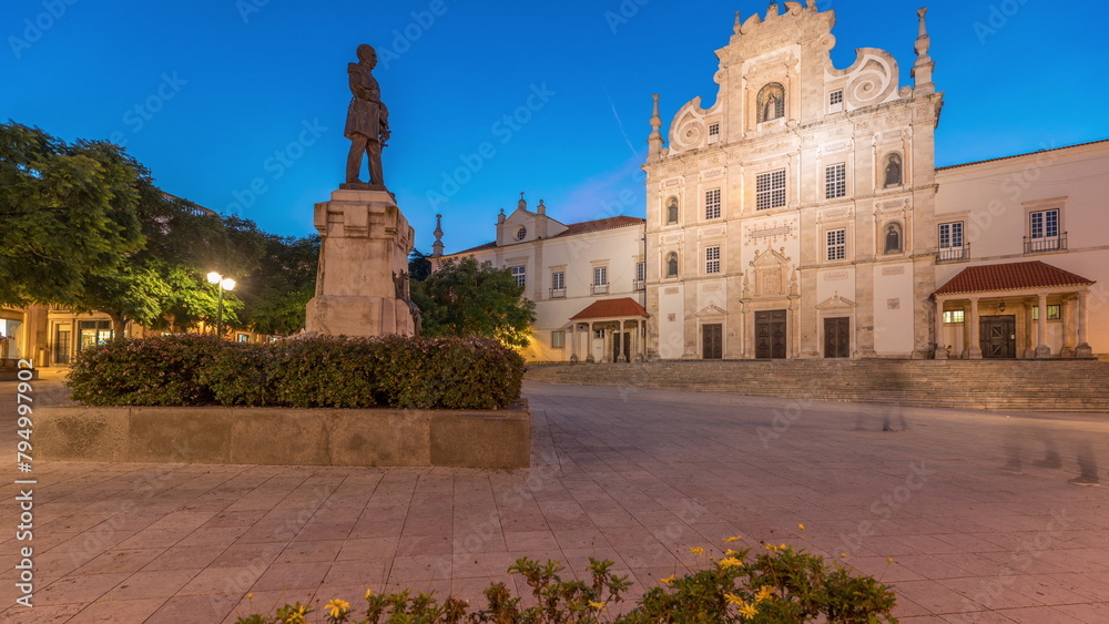 Panorama showing Sa da Bandeira Square with a view of the Santarem See Cathedral day to night timelapse. Portugal