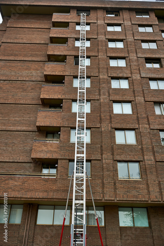 Fportable forklift on the façade of a building to lift construction material to the upper floorsrancisco Javier Diaz Benito photo