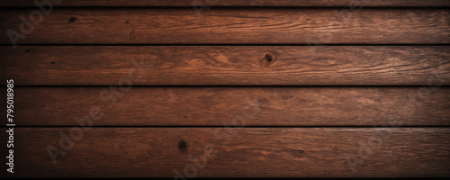 The wooden background, the planks are rich in colour and texture, reflecting the warm tones of the wood. 