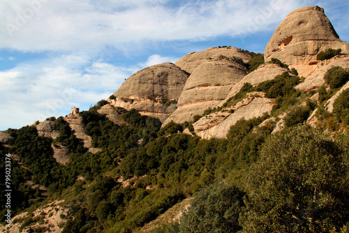 View of the mountains and the church Ermita de Sant Joan in the National park near the monastery of Montserrat, Barcelona, Catalonia, Spain photo
