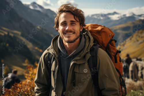 A man travels in the mountains with a backpack.