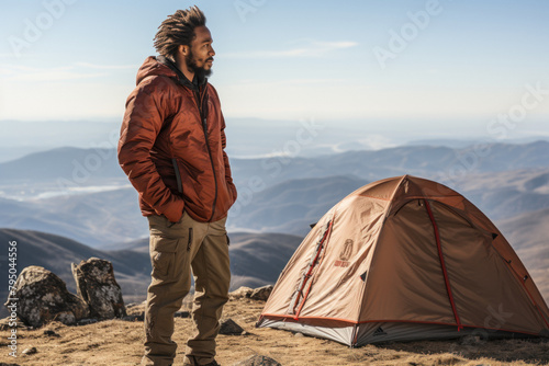 Happy on the background of an unfolded tent.