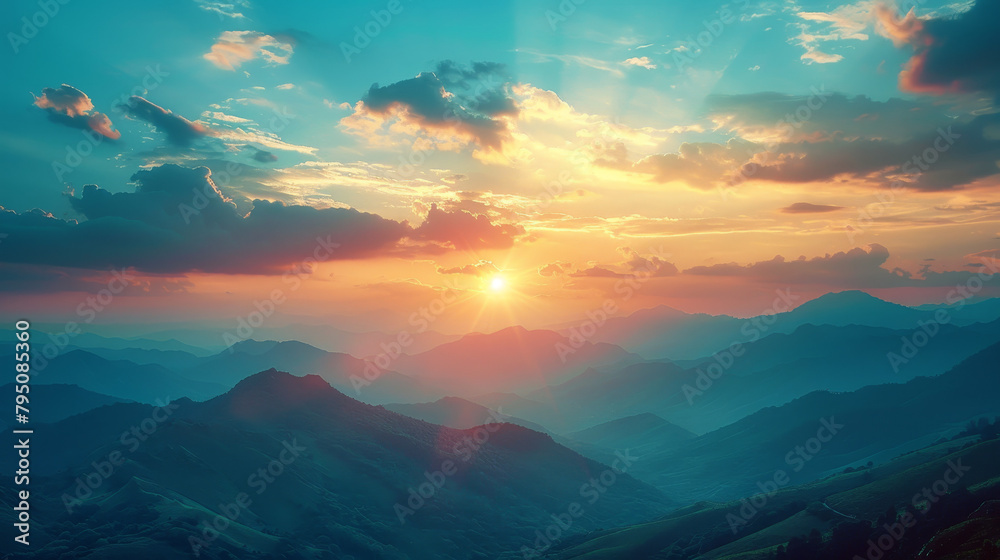 The sun is setting over the mountains, casting a warm glow over the landscape