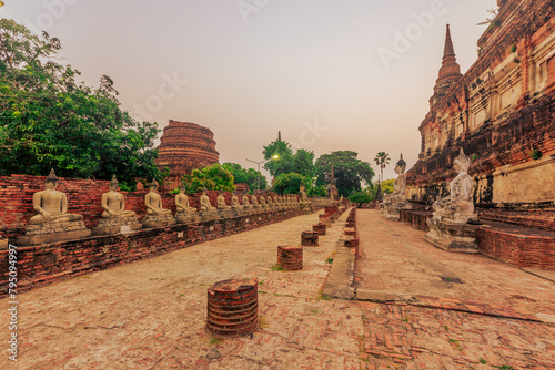 background of important religious tourist attractions in Ayutthaya Province of Thailand Wat Yai Chai Mongkol has an old Buddha image from the Krungsri period allowing tourists from all over the world