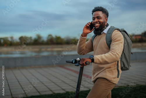 Man smiling during phone call (ID: 795103551)