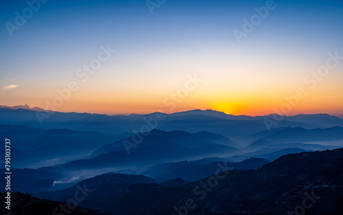 gloomy sunrise over mountains in Nepal. © gorkhe1980