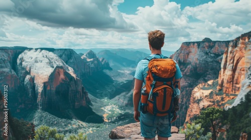Man With Backpack Overlooking Canyon