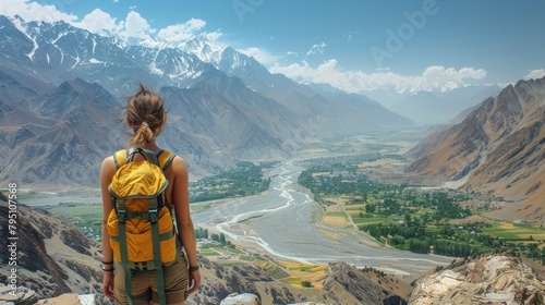 Man With Backpack Overlooking Canyon
