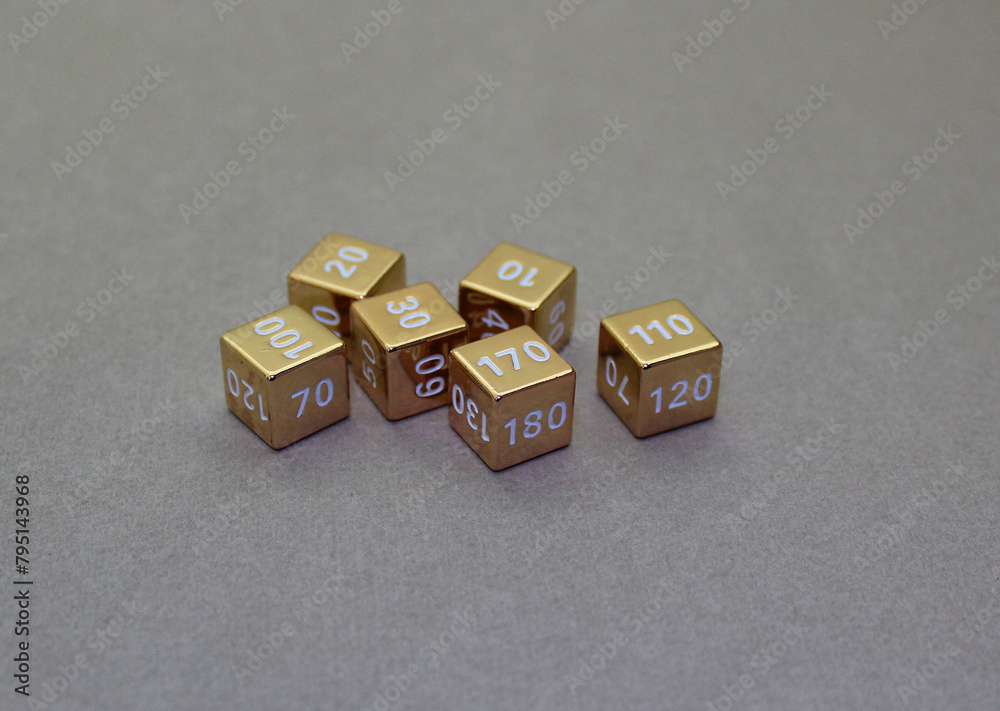 Golden dice with numbers. Game dice.
Golden dice with numbers. Game dice.