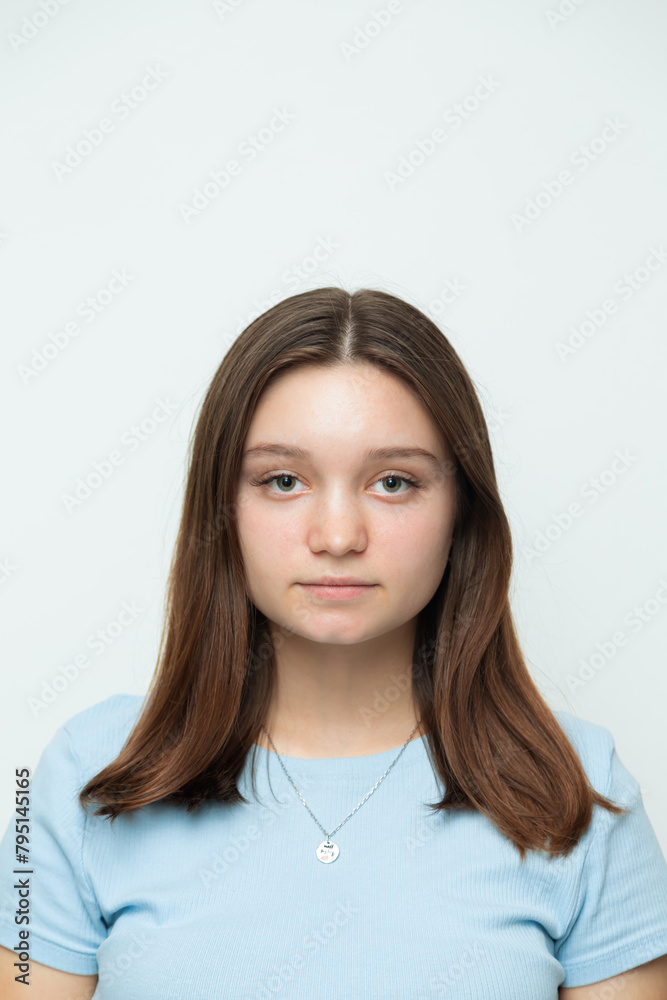 Confident caucasian girl posing and looking at the camera. Confident caucasian girl posing and looking at the camera.