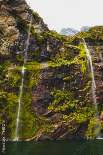 Waterfall flowing down rocks in the mountains