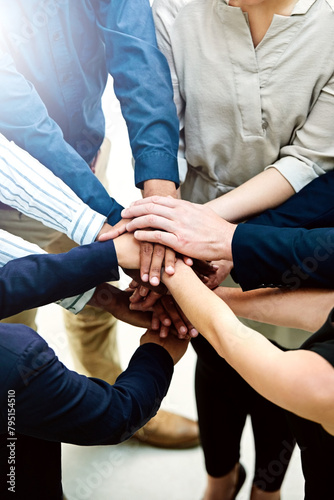 Business people  hands and pile for teamwork solidarity or partnership as b2b project  target or goals. Colleague  circle and tech startup or community collaboration with stack  huddle or support