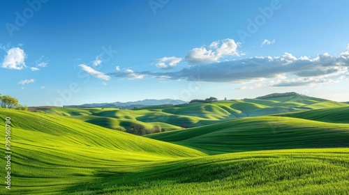 Peaceful landscape with rolling hills and a clear blue sky