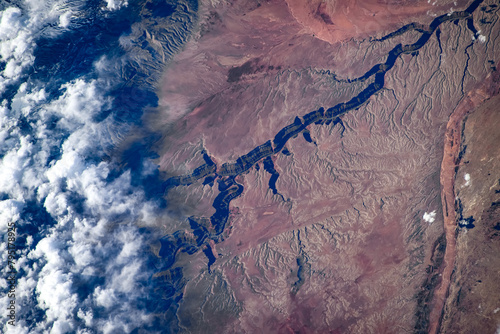 Cracked Land Feature, New Mexico, USA. Digital enhancement of an image by NASA