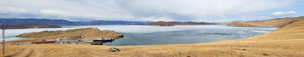 Panorama of Lake Baikal in spring, at the moment of melting ice. View of the Olkhonsky Gate Strait