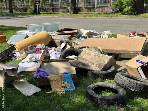 Garbage next to the road in the city