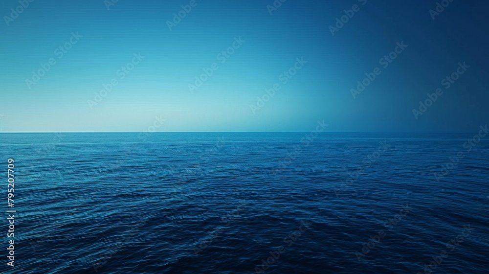 The clear blue ocean stretches infinitely under a bright sky, symbolizing freedom and the vastness of nature.