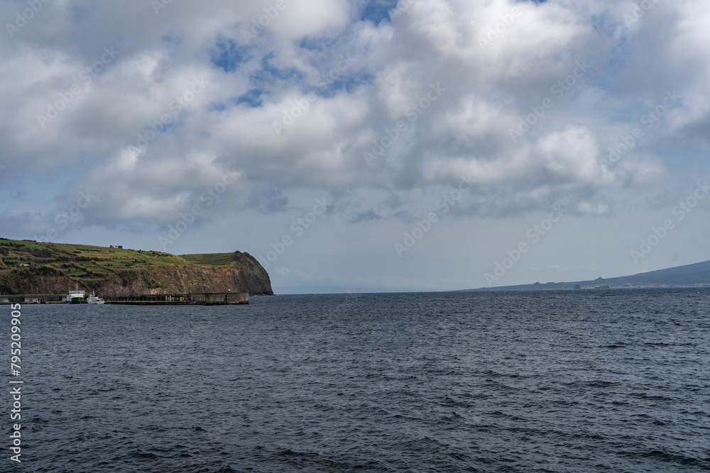 Azores, Faial, Pico. View of the islands of Faial and Pico from a ferry sailing between the islands.