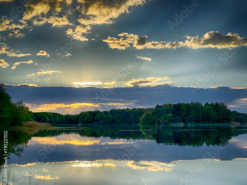 Serene Fishing Lake: A peaceful scene by the tranquil waters of a secluded fishing lake