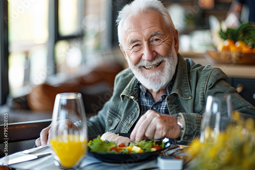 Elderly gentleman in an assisted living facility, contentedly enjoying a nutritious meal, exemplifying a lifestyle of wellness and satisfaction photo
