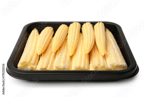 Fresh young baby corn in plastic container