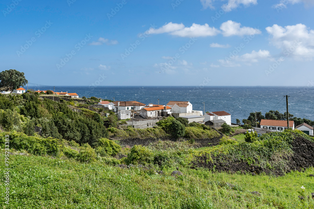 Fototapeta premium Azores. Pico Island. Atlantic Ocean. Beautiful landscape panoramic view of the coast. Amazing seascape. The vineyards. Villas and houses in the Azores.
