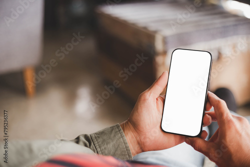 cell phone blank white screen mockup.hand holding texting using mobile on desk at office.background empty space for advertise.work people contact marketing business,technology © panitan