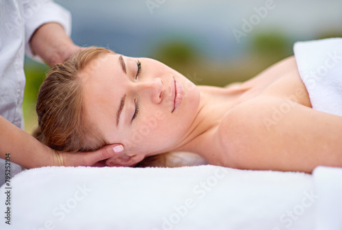 Woman, spa and relax with head massage with comfort for stress relief with beauty or health. Calm, zen and resting with masseuse hands for wellbeing on holiday for bliss with professional for peace