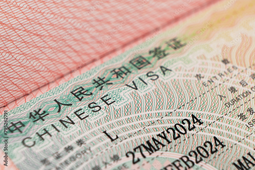 Fototapeta premium Close Up Chinese visa is approved. Applied visa in passport for traveling to China