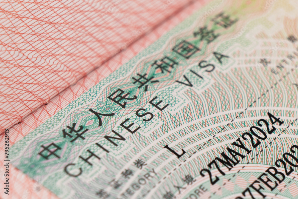 Fototapeta premium Close Up Chinese visa is approved. Applied visa in passport for traveling to China