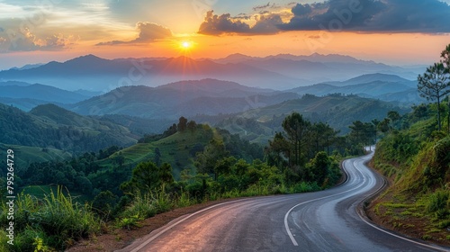 Asphalt highway road and mountain natural scenery at sunrise. Panoramic view. © vadymstock
