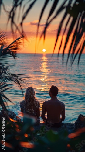 Beach travel, couple relaxing on a tropical beach at sunset in a hotel. Vacation and tourism © vadymstock