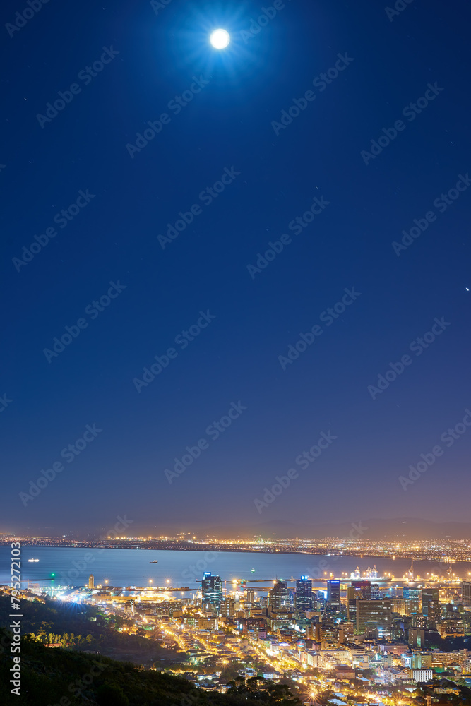 Cityscape, building and coastal lights and night view or location as urban infrastructure, development or sea. Skyscrapers, sky and moon or evening with downtown journey or Miami travel, trip or town